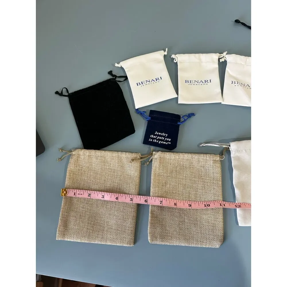 Collection of jewelry bags pouches gift bags various sizes and materials